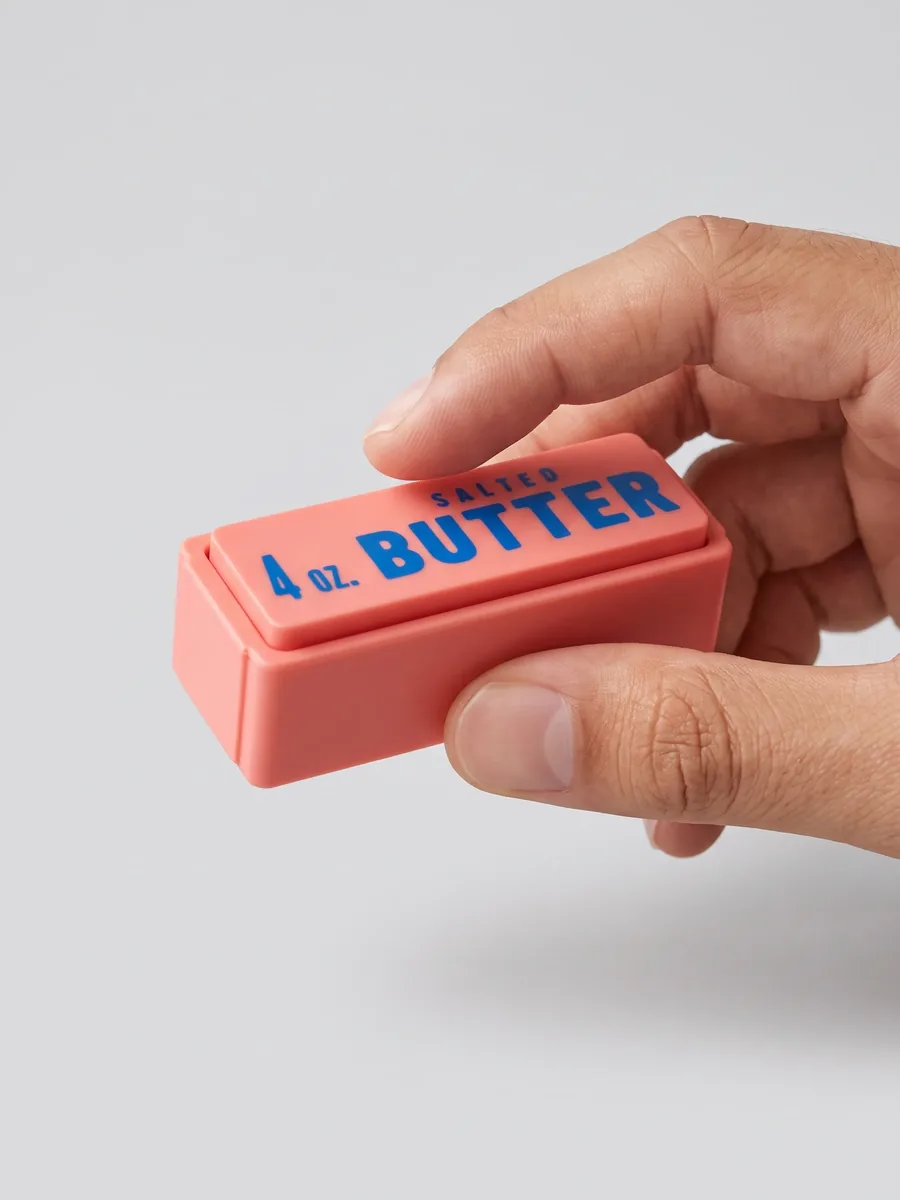 Clicker Mantequilla Salada en la mano